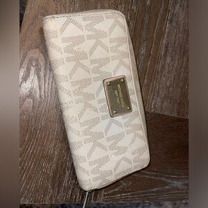 MK wallet in brown and cream